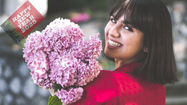 Woman holding hydrangeas, New Year 2025