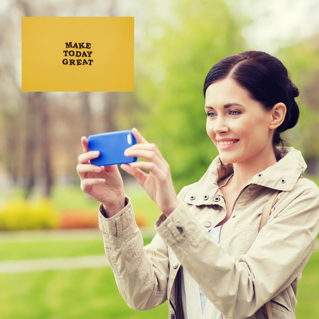 An image of a lady catching a picture for smile captions for Instagram.