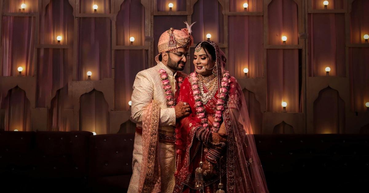 Bhaiya and Bhabhi in traditional wedding attire on their anniversary
