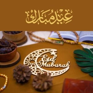 Crescent moon with Eid Mubarak written in elegant calligraphy for Eid ul Fitr celebration.