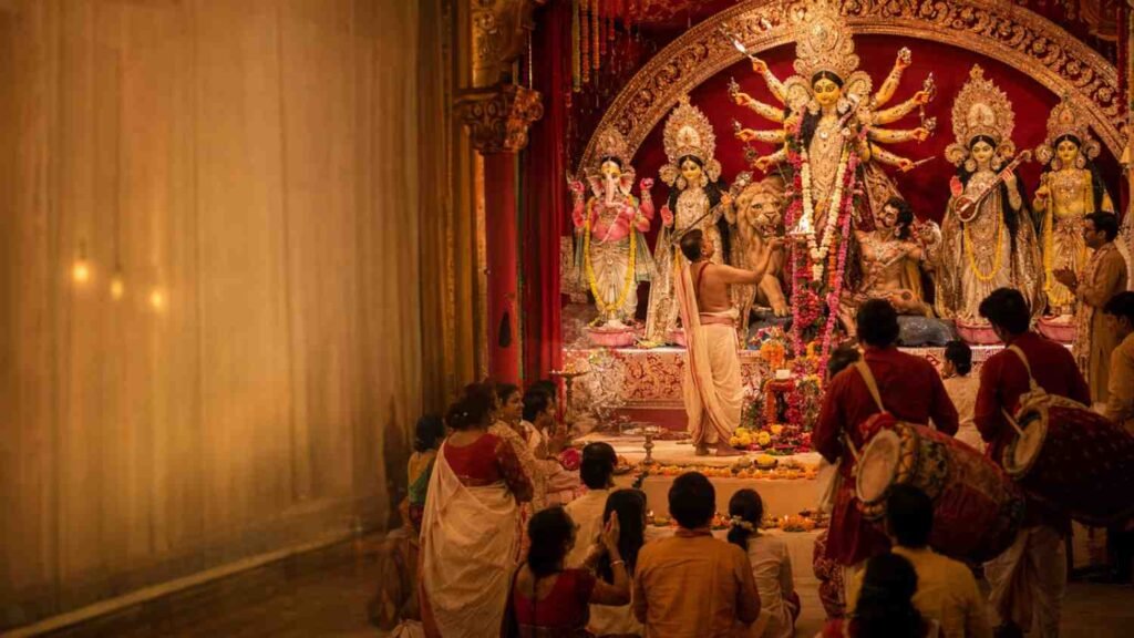 Durga Puja festival guide showing Goddess Durga, traditional rituals, dhak, pandal art and community celebration