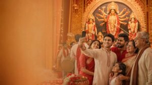 Durga Puja Status Bengali shared through a smartphone during a joyful Bengali family celebration Image Title: Durga Puja Status Bengali