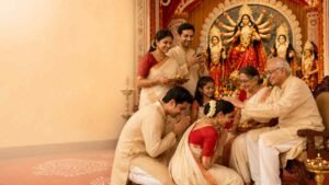 Durga Puja Wishes in Bengali shared by a Bengali family while exchanging blessings and sweets before Goddess Durga